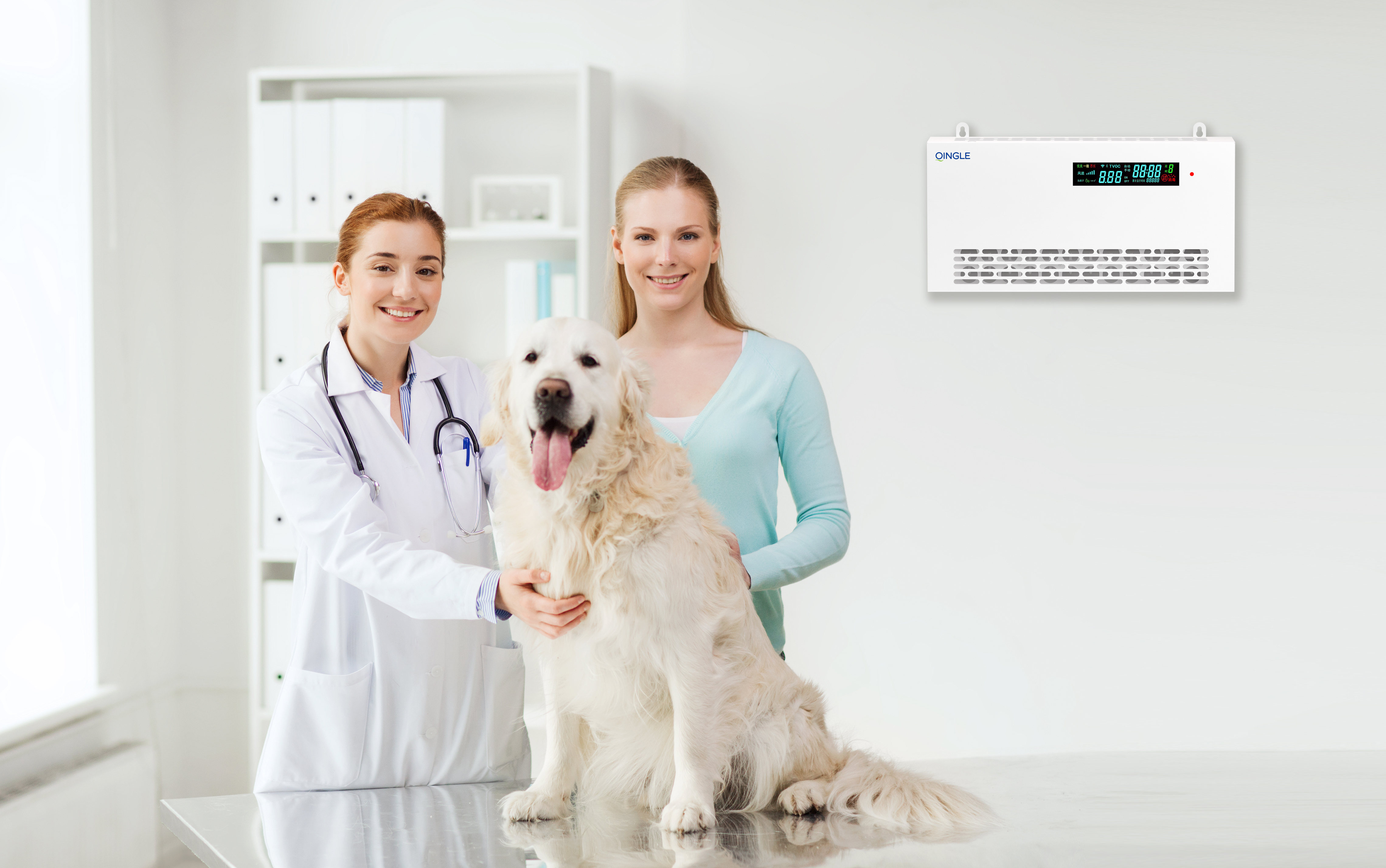 happy woman with dog and doctor at vet clinic